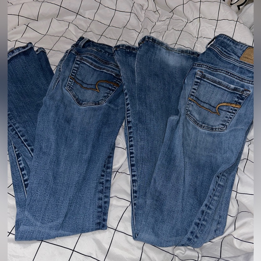 size 0 super stretch american eagle jeans (2 pairs)